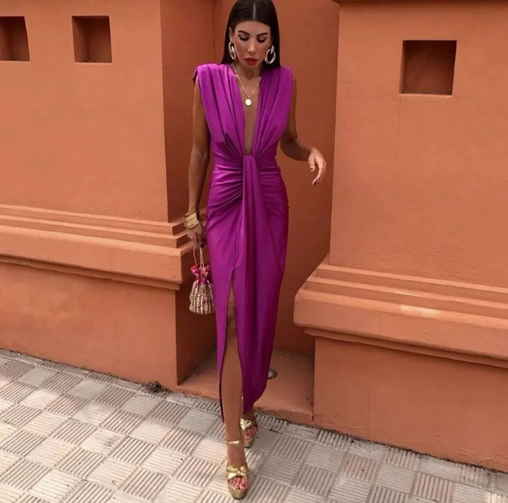 Side view of the Amelia Soft Pleated Midi Dress showing the midi length and relaxed fit