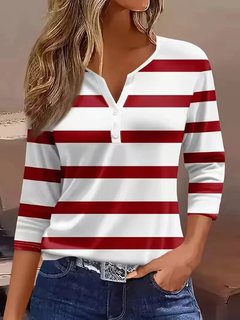Front view of the Amelia striped V-neck top with ¾ petal sleeves shown in a bold horizontal stripe pattern