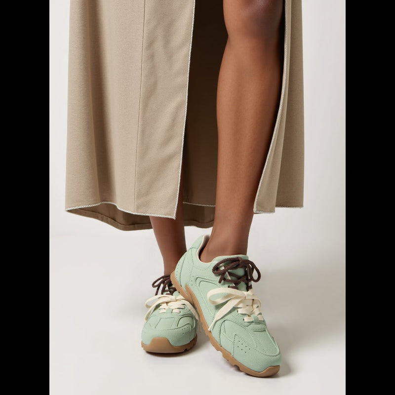 Anastasia suede sneakers in gray, top-down view showing lace detail and suede texture