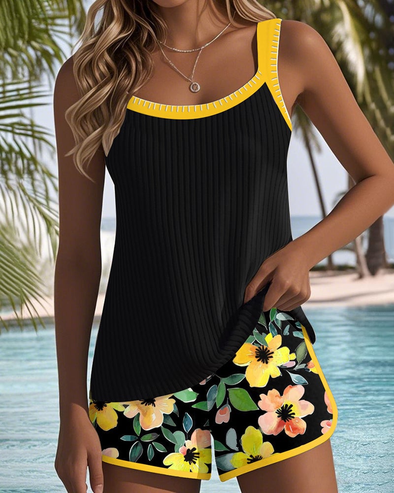 Model wearing the Anastasia two-piece tankini set in yellow poolside