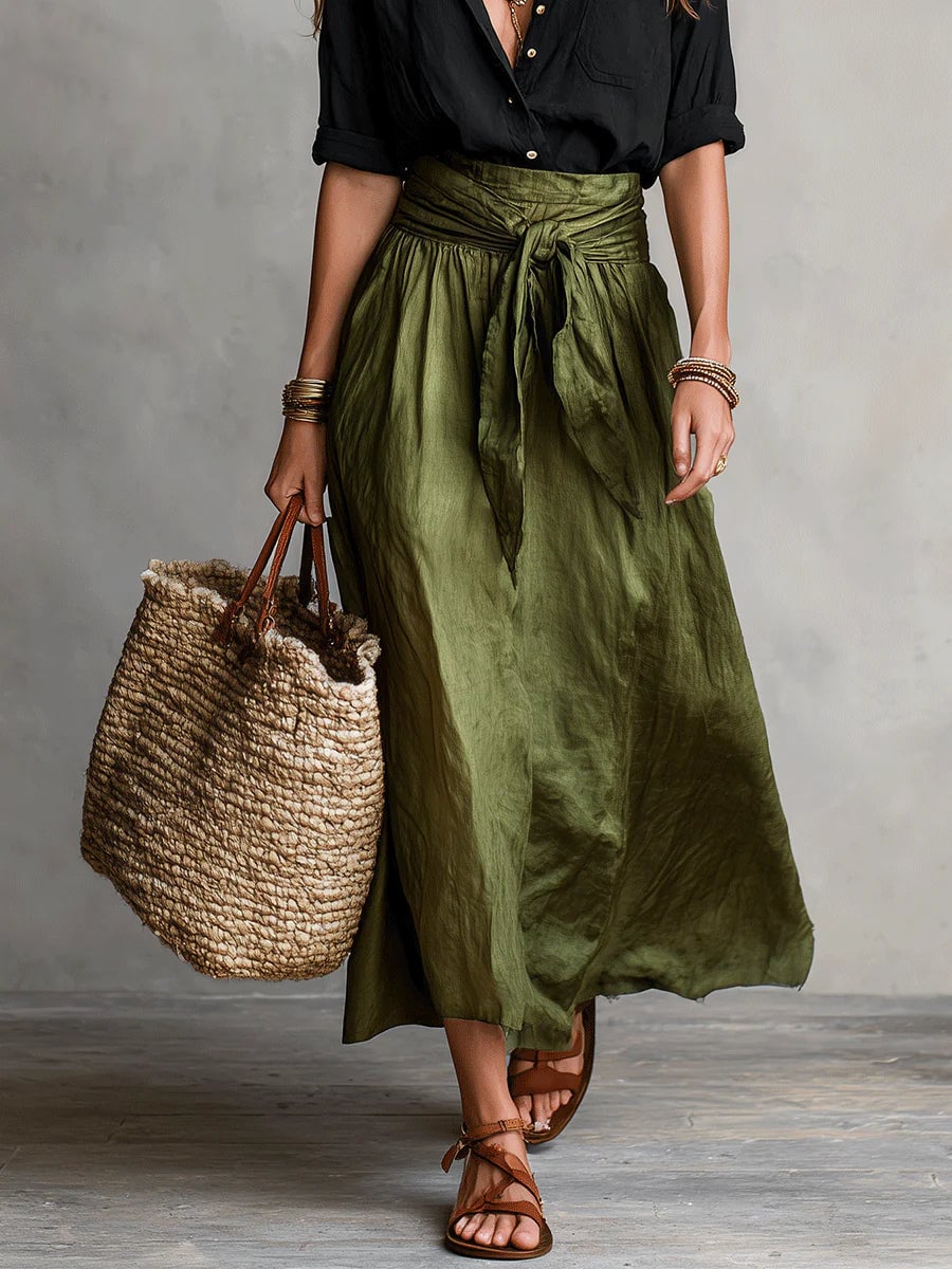 Full-length lifestyle shot of the Anastasia green two piece set styled for a warm-weather occasion