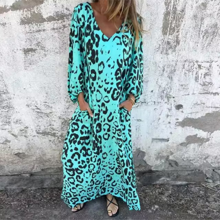 Andrea flowing spring dress in white styled with sandals for a relaxed daytime look