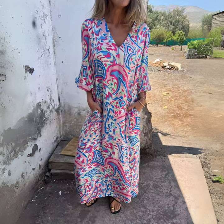 Size range display of the Andrea spring dress from S to 3XL in multiple color options