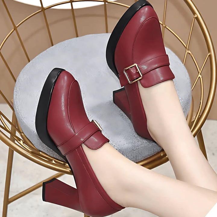 Pair of Anita orthopedic pumps in black and red displayed together on a neutral background