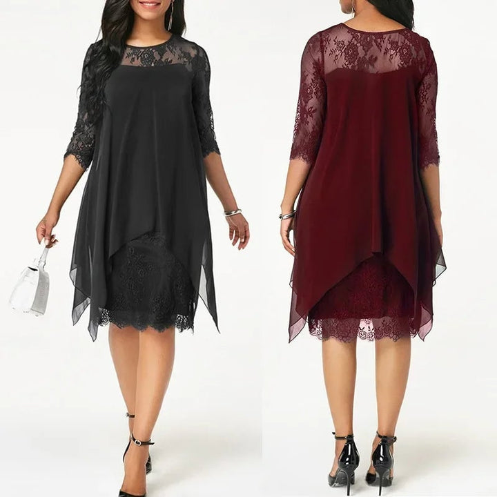 Close-up of lace cuff and quarter sleeve detail on a chiffon dress in navy blue