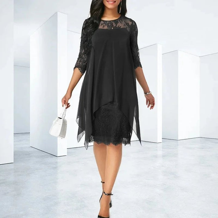 Back view of a black quarter sleeve chiffon dress with lace neckline detail