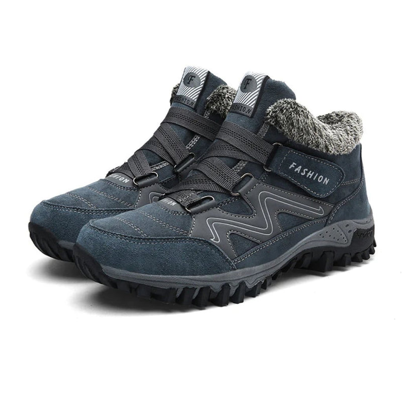 Side profile of Anne waterproof boots showing cushioned sole and sleek silhouette