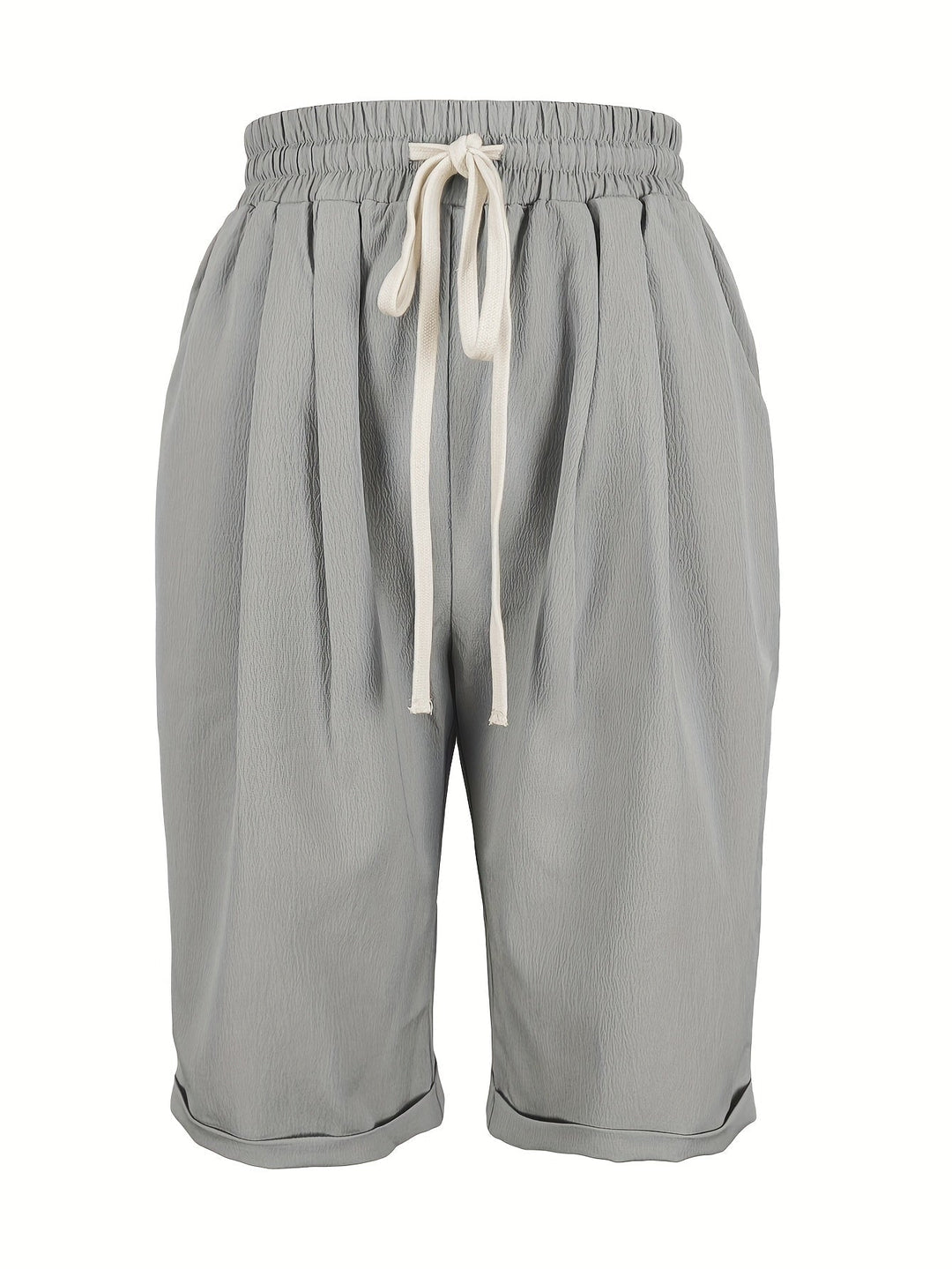 Flat lay of relaxed capri pants in gray on a light background
