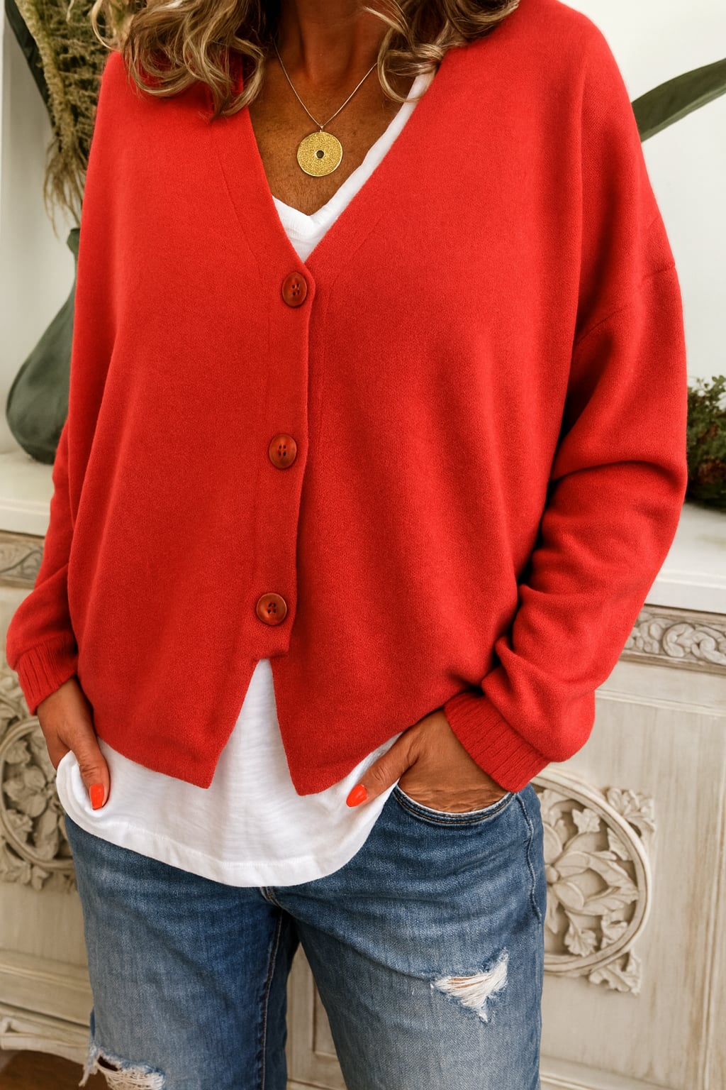 Full-length view of the Annelise cardigan in a vibrant color, perfect for transitional season dressing