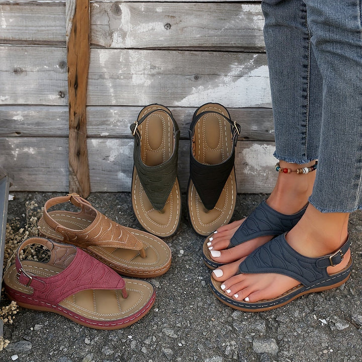 Annette women's orthopedic clip-toe sandal in burgundy, side view showing arch-support sole