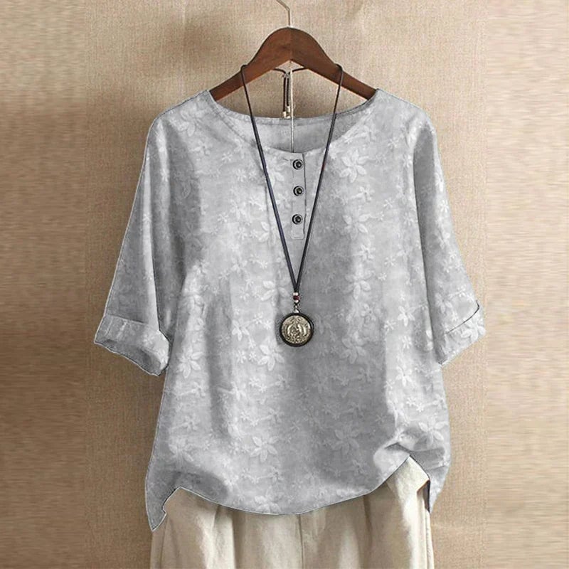 Anya blouse in gray colorway highlighting the soft breathable fabric