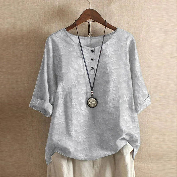 Anya blouse in gray colorway highlighting the soft breathable fabric