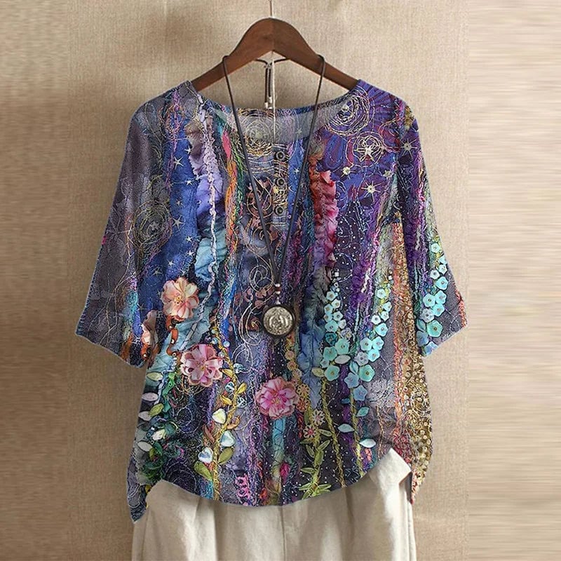 Flat lay of the Anya retro-inspired blouse showing the full floral pattern