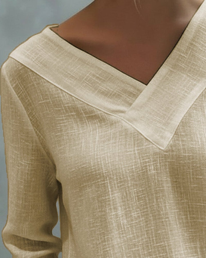 Detail shot of rolled cuff on Aria long sleeve top