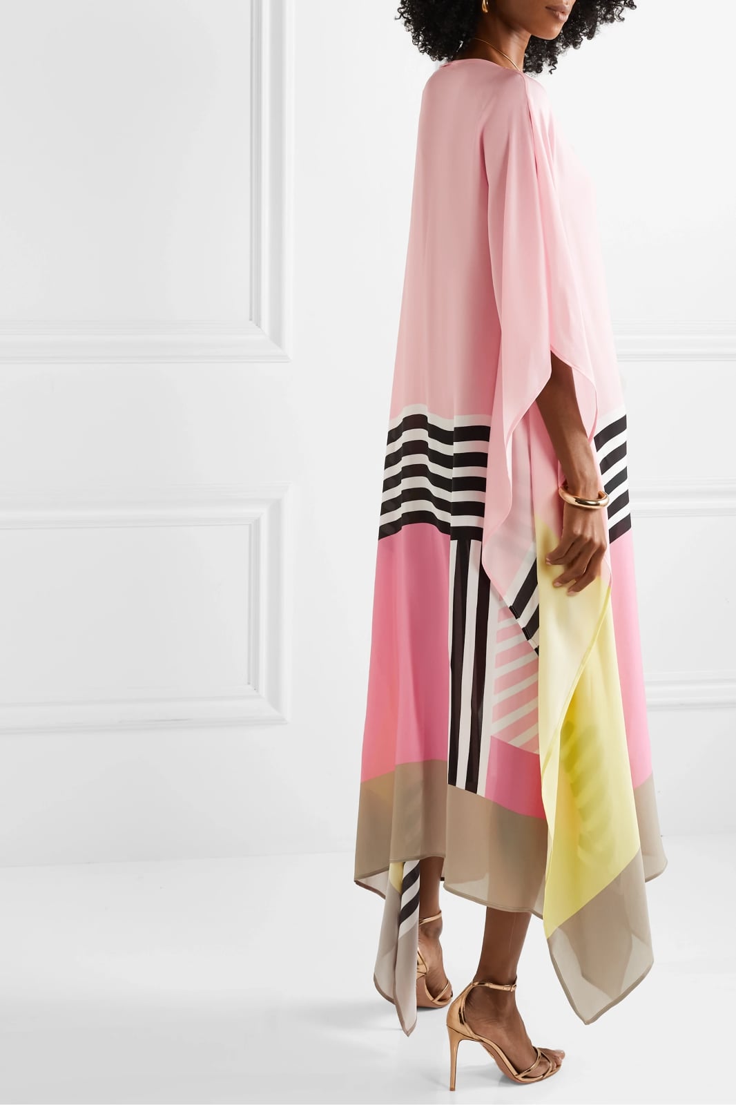Aria caftan maxi dress in yellow, side view highlighting flowing fabric
