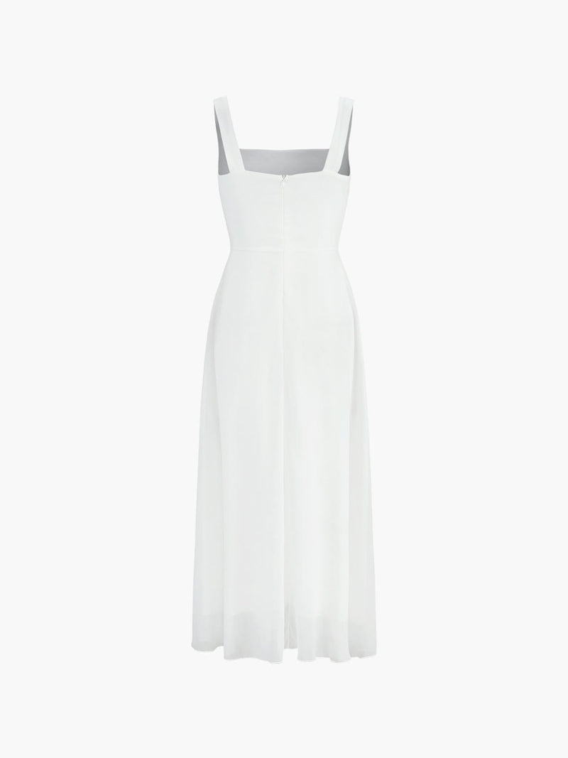 Woman wearing the Aria black square neck A-line midi dress, full-length front view