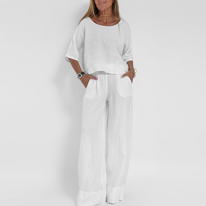 Side view of the Arianah elegant set in white, highlighting the structured yet comfortable drape