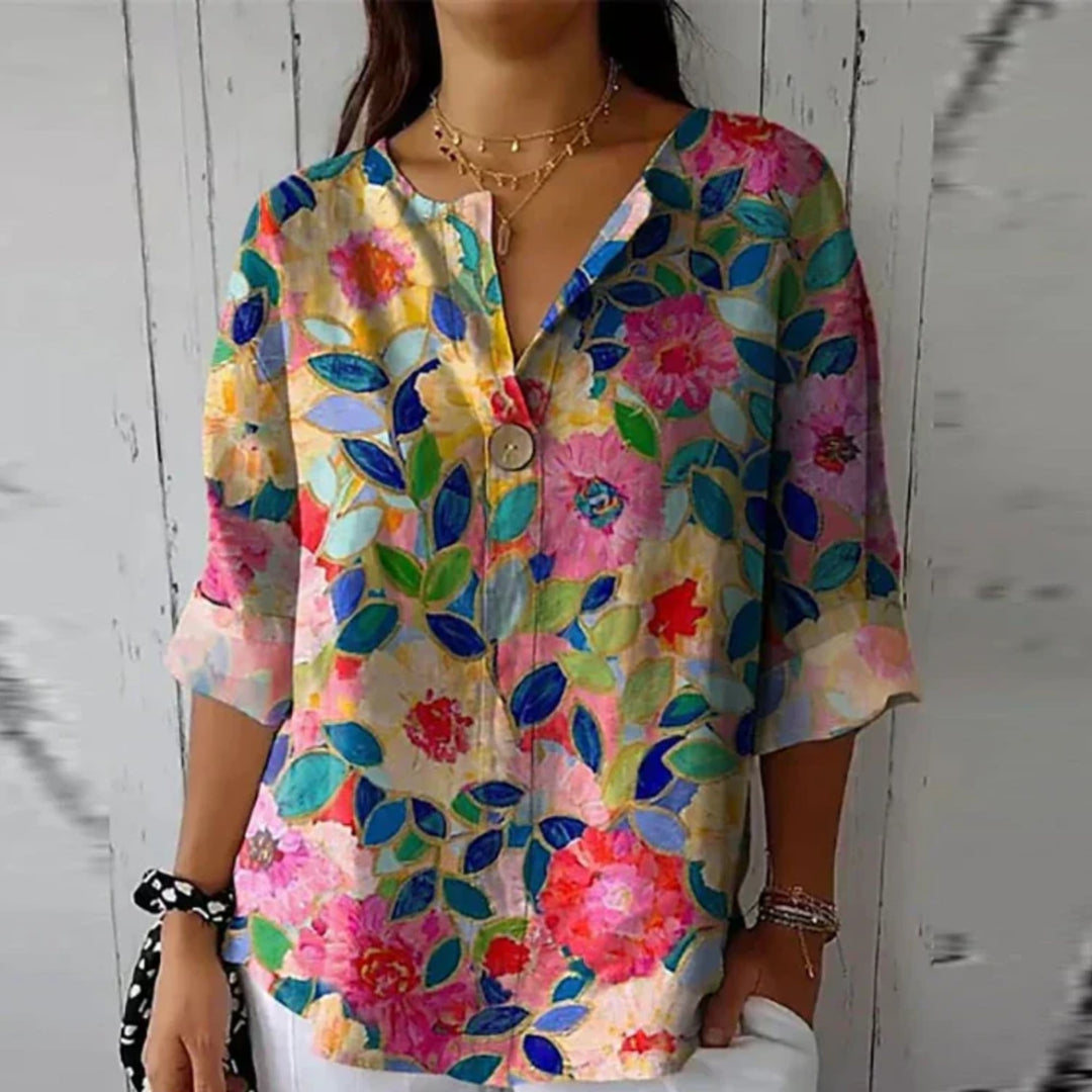 Side view of the Arlene floral print blouse highlighting the flattering fit and feminine silhouette