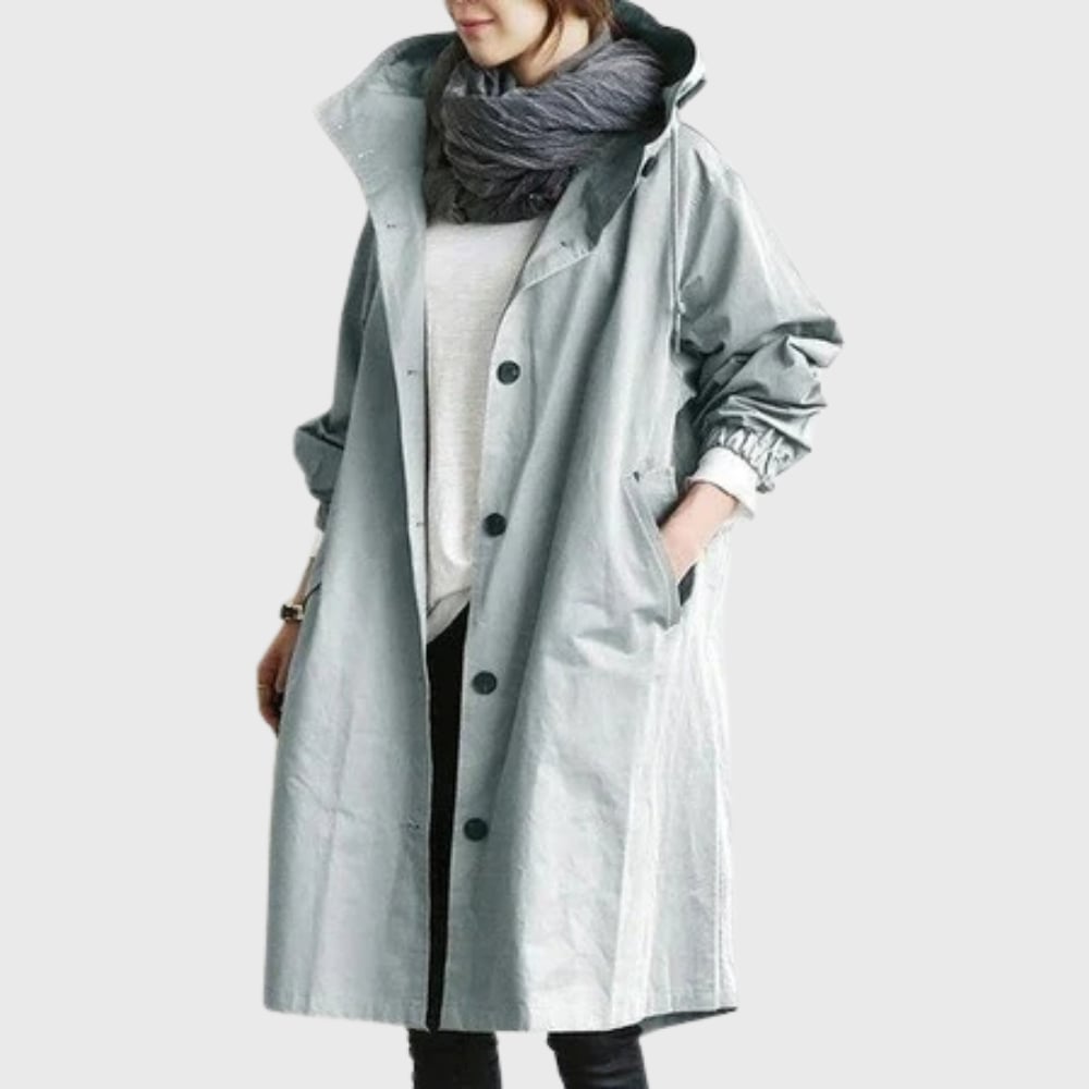 Close-up of the Arline trench coat belt and secure front fastenings detail