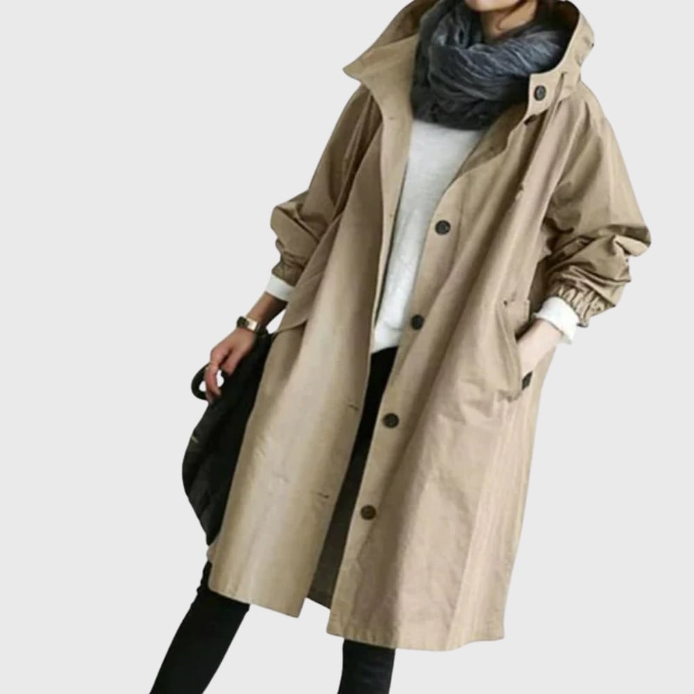 Arline waterproof trench coat in black styled over tailored trousers