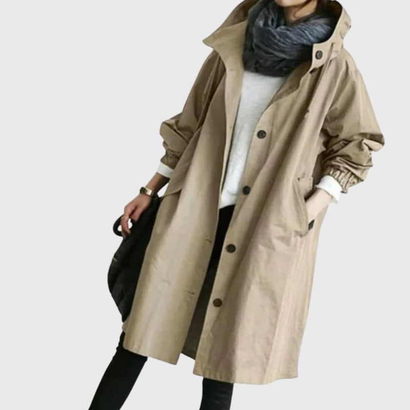 Arline waterproof trench coat in black styled over tailored trousers