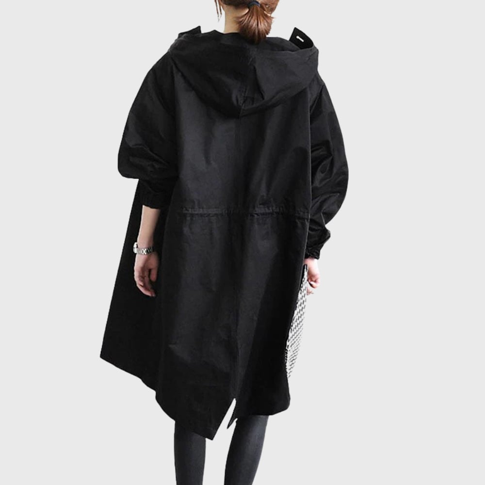 Flat lay of the Arline waterproof trench coat showing full length and color options
