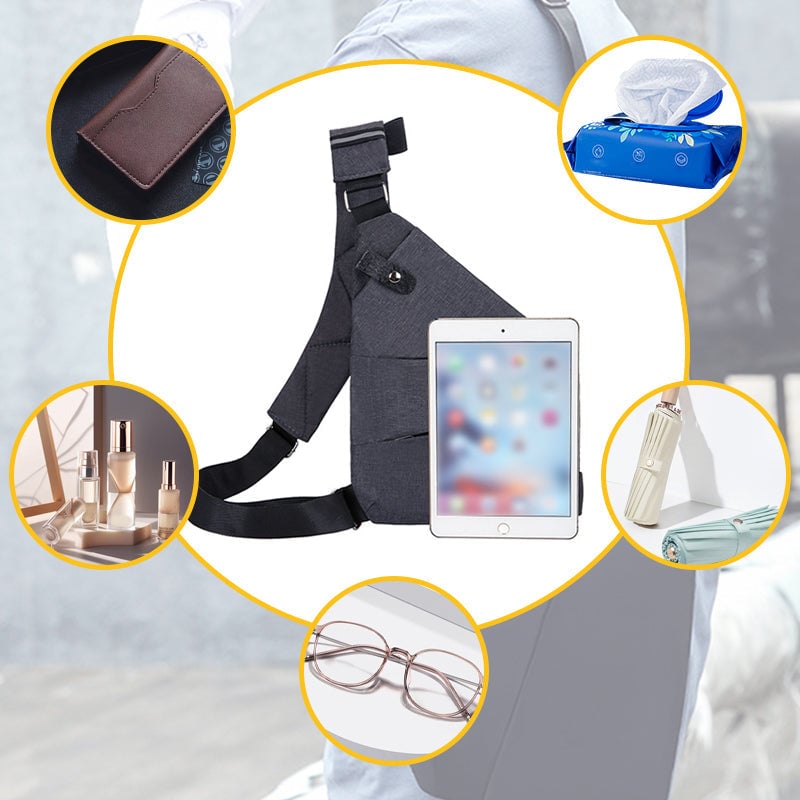 Purple crossbody bag with organized interior compartments laid flat on a neutral surface