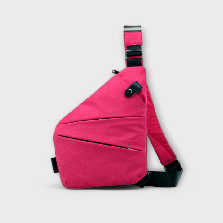 Crossbody bag in Black styled with denim and sneakers for a casual look