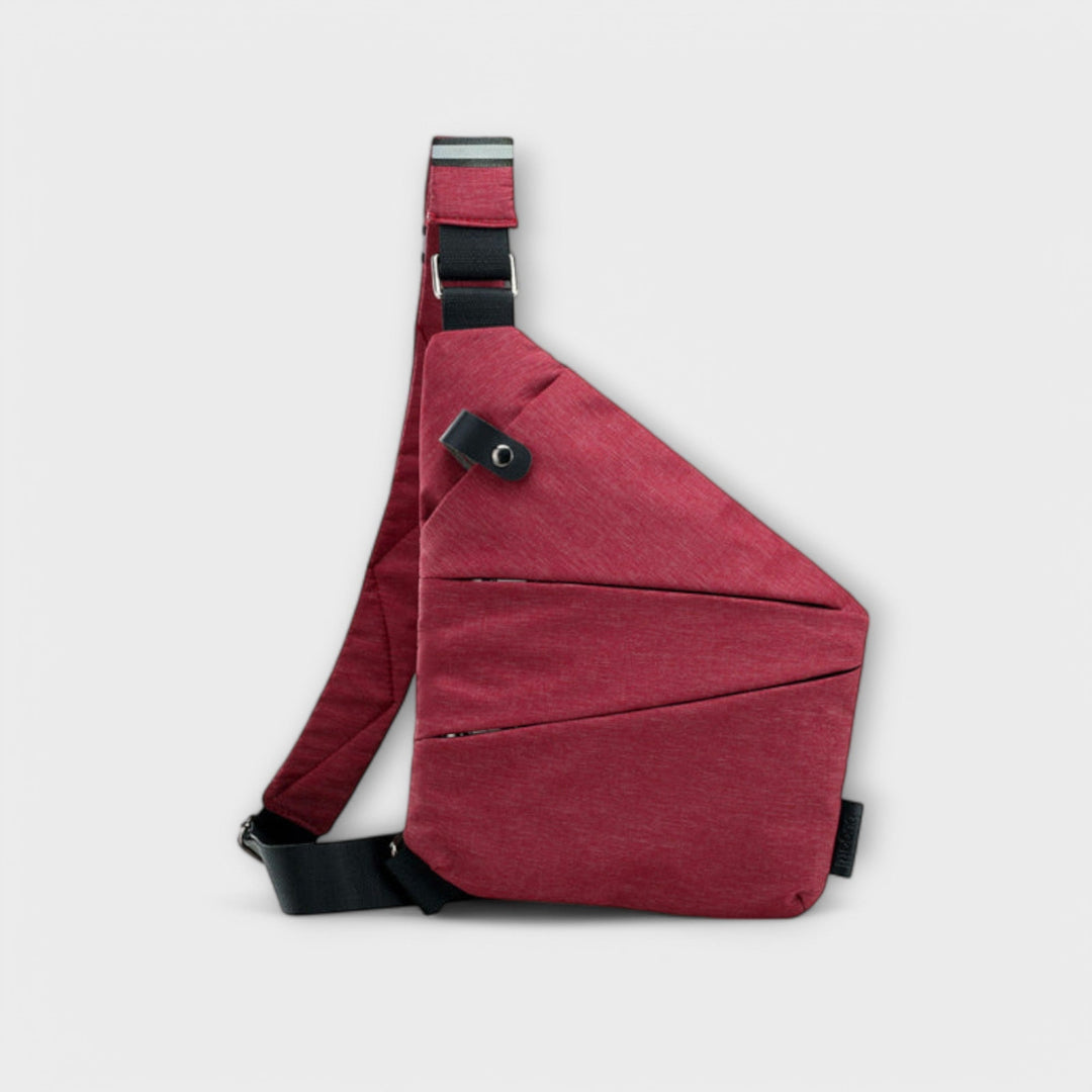 Detail shot of crossbody bag exterior pocket in Purple colorway
