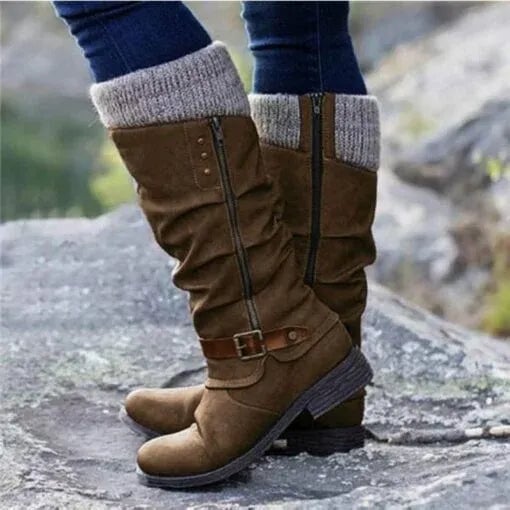 Women's ankle boots styled with jeans, showcasing the leg-lengthening ankle-height cut