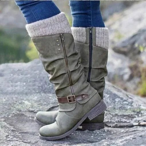 Bottom sole view of women's ankle boots showing supportive construction and durable outsole