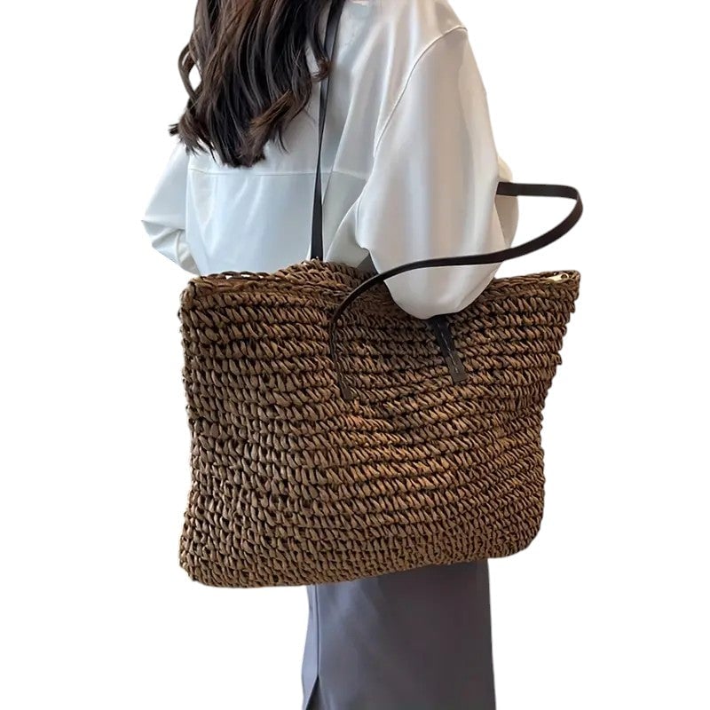 Coffee-colored beach tote bag standing upright on a light background