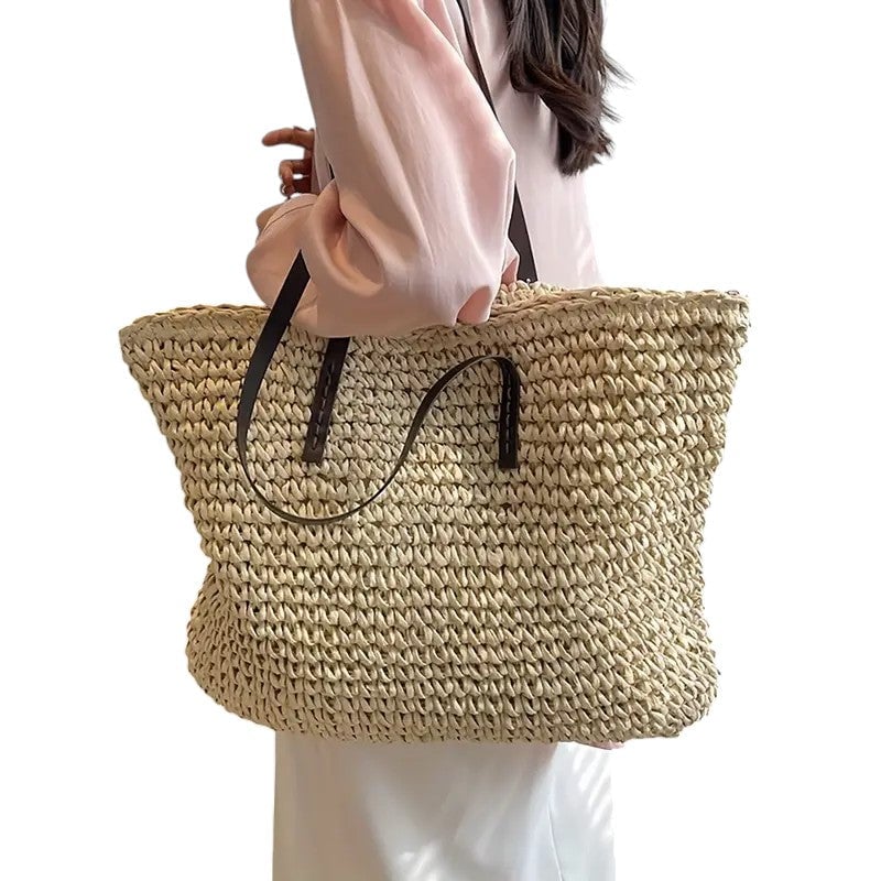 Close-up of shoulder straps and top handles on the natural beach tote bag