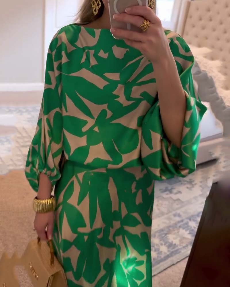 Pink two-piece printed lantern sleeve set styled on model, front view