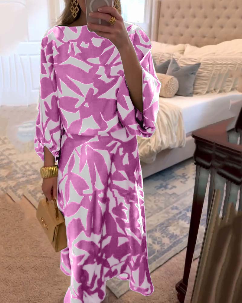 Blue two-piece printed set shown on model, three-quarter view