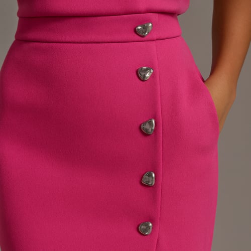 Flat lay of the Effortless Charm Midi Dress showing fabric texture and button slit
