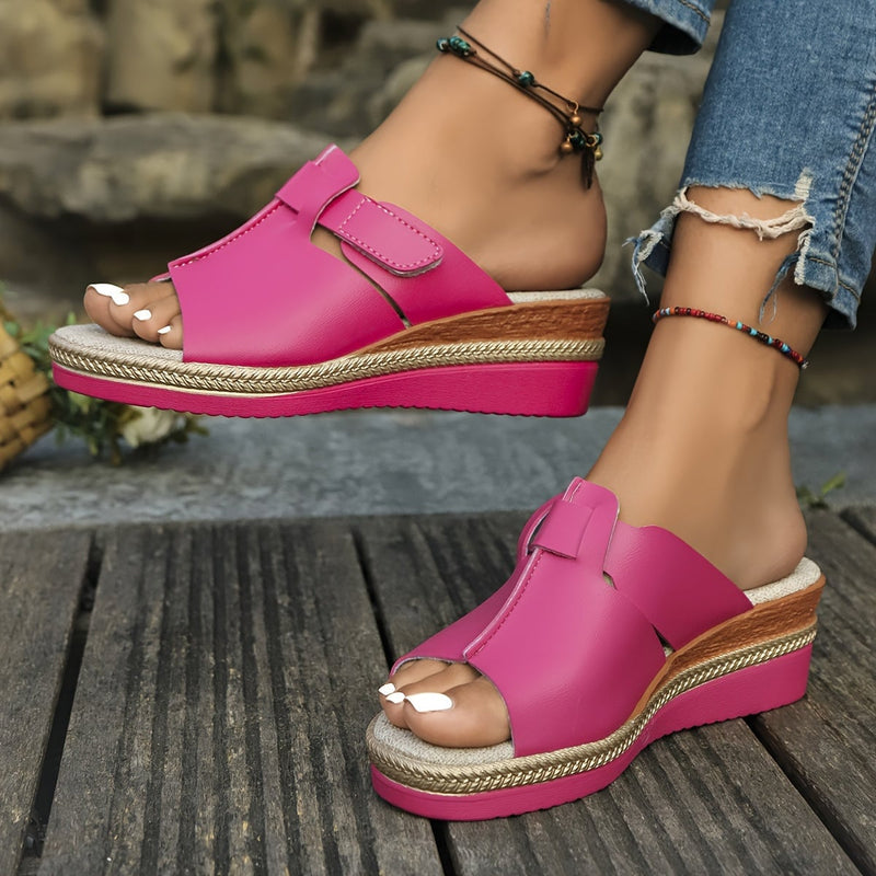 Aster women's sandals in green, top-down view showing strap detail