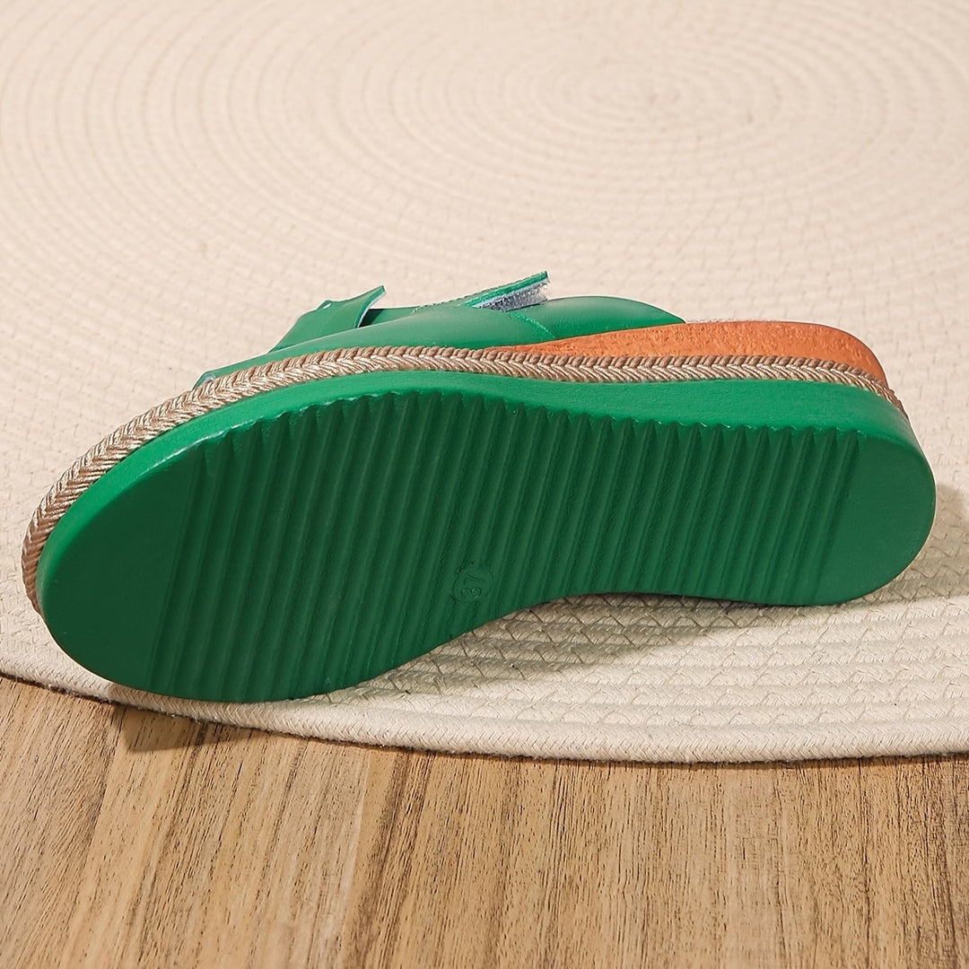 Aster women's sandals in magenta, top view showing strap and footbed