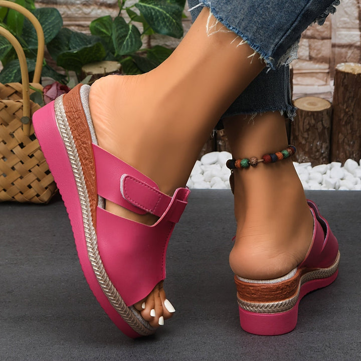 Flat lay of Aster sandals in all six colors: green, lemon yellow, magenta, orange, royal blue, and red