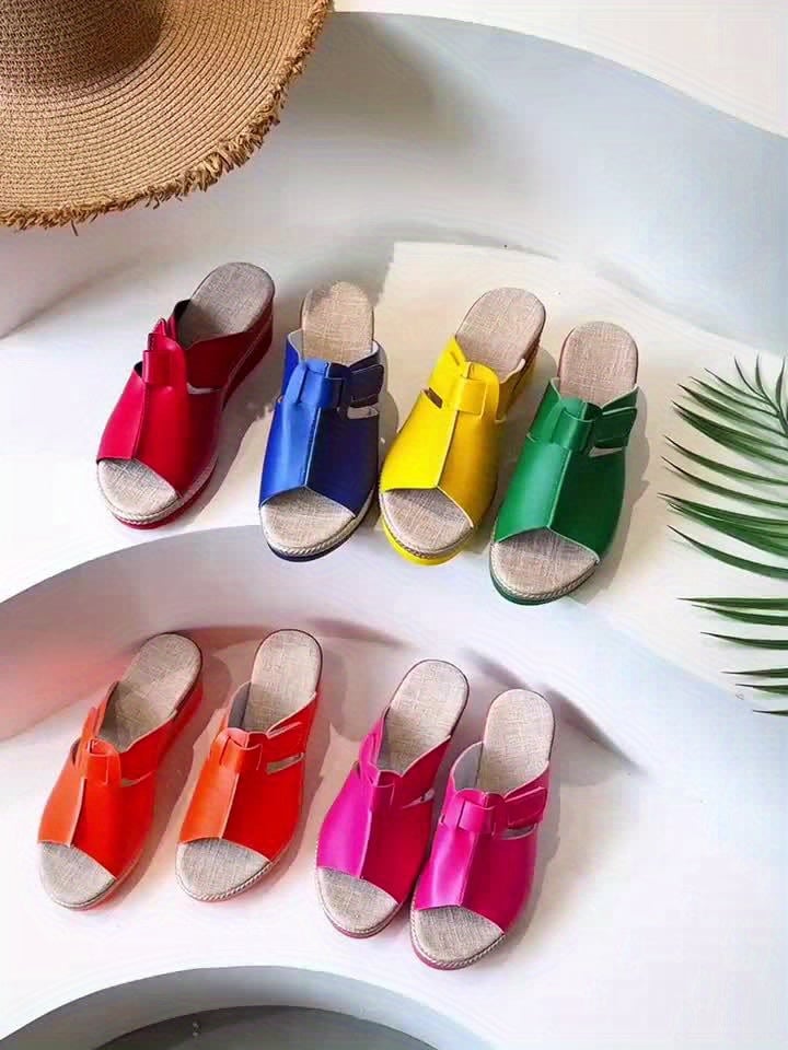 Side-by-side color comparison of Aster sandals in green and red