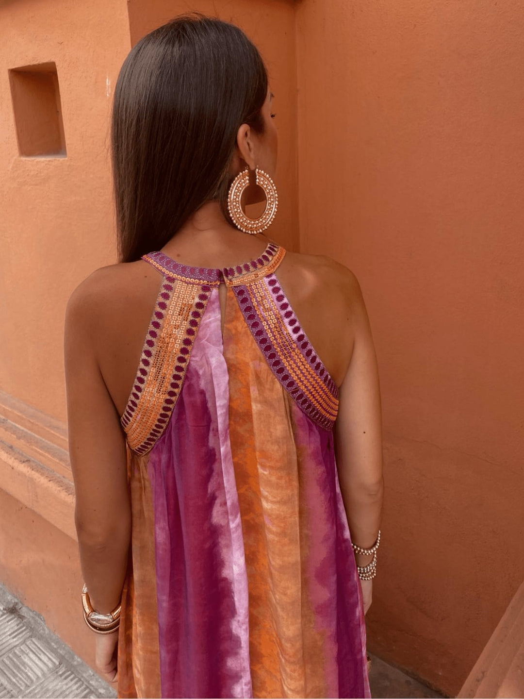 Side profile of the Aster ombre wedding guest dress highlighting the lengthening silhouette