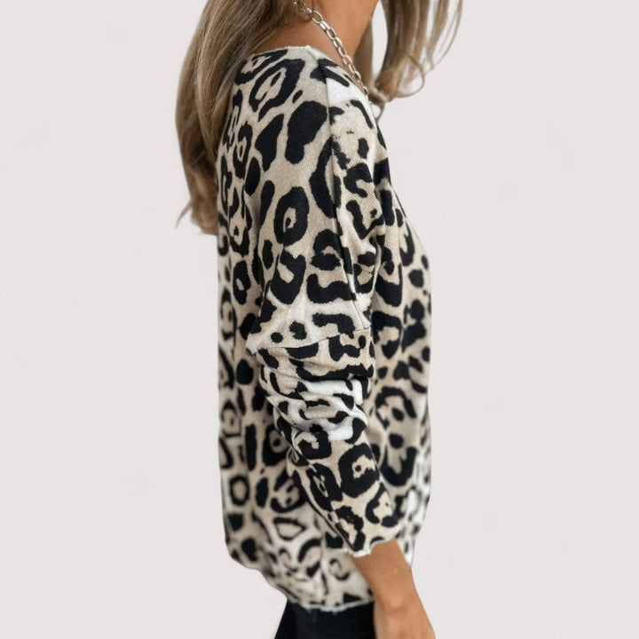 Side view of the lightweight leopard print top showing smooth drape and easy fit