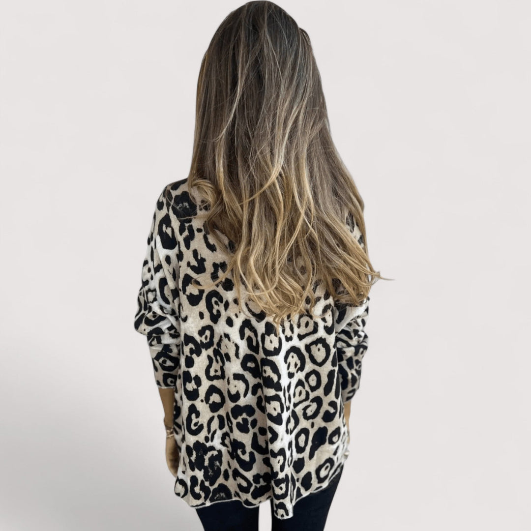 Flat lay of the lightweight leopard print top in brown colorway