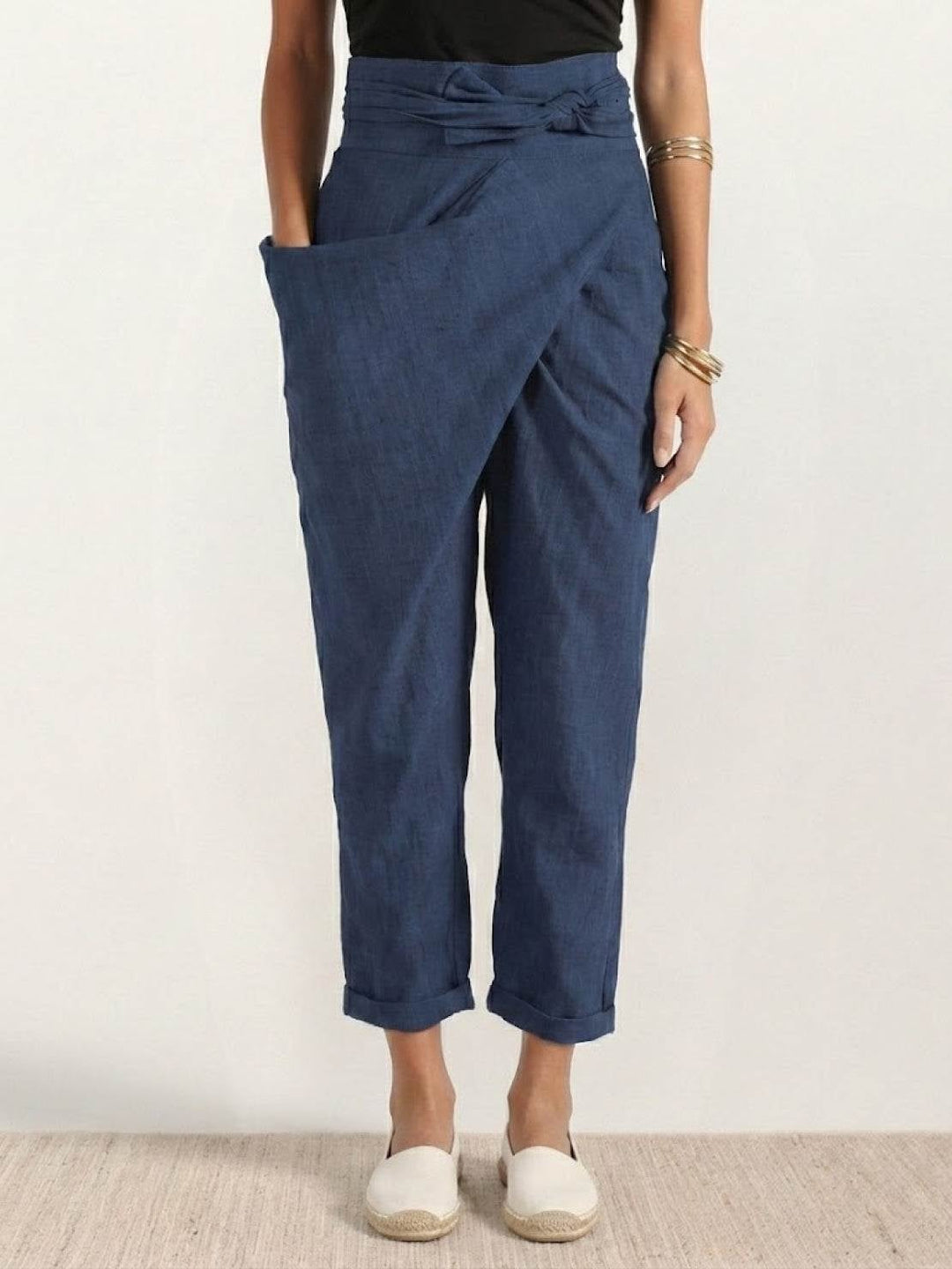 Front view of navy blue high waist wrap front cropped pants