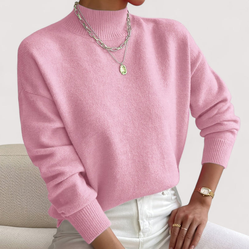 Close-up of the elegant turtleneck collar detail on a cozy knit sweater