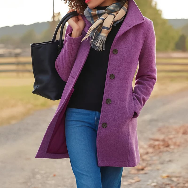 Model wearing the Aubrey coat in a warm tone showcasing the straight flattering cut