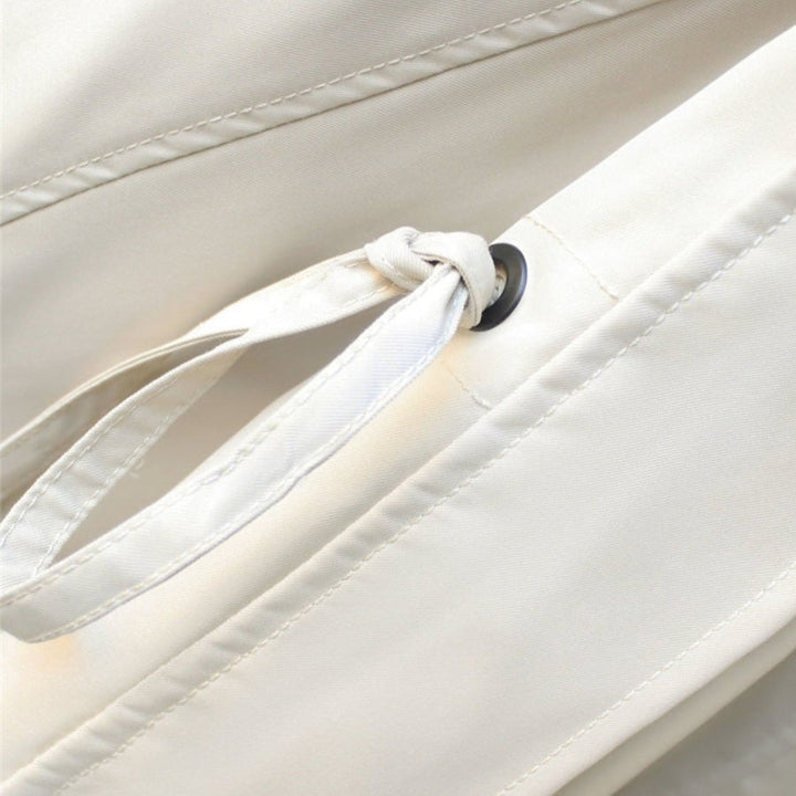 Back view of the Aurelia windbreaker jacket in white showing clean seam detailing