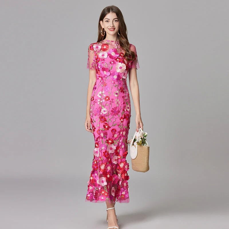 Full-length side profile of the Aurelia floral appliqué maxi dress in yellow