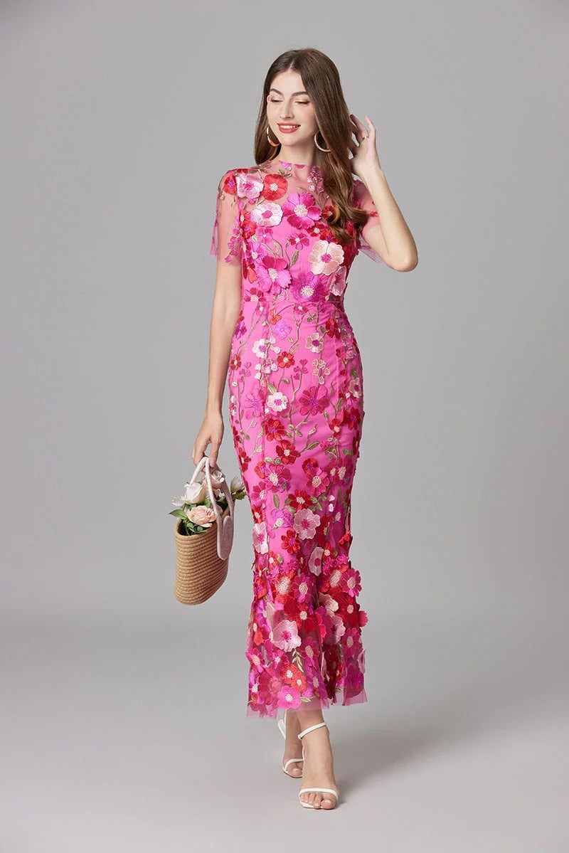 Back view of the Aurelia floral sheer mesh maxi dress in beige