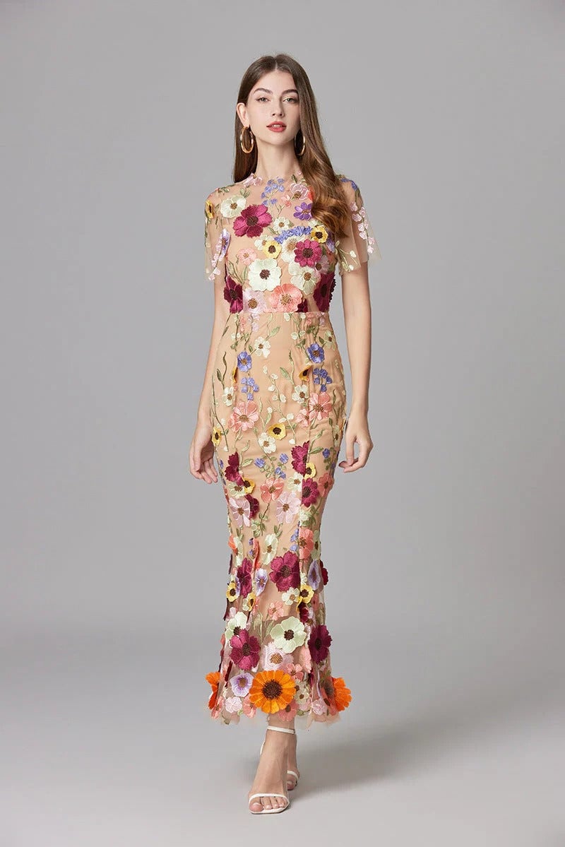 Full-length front view of the Aurelia sheer mesh maxi dress in beige